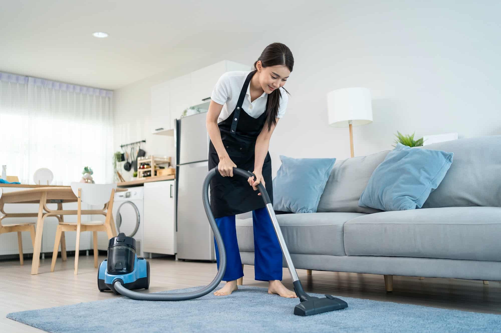 asian-cleaning-service-woman-worker-cleaning-in-living-room-at-home-.jpg